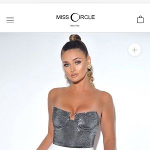 Never worn silver metallic body suit !